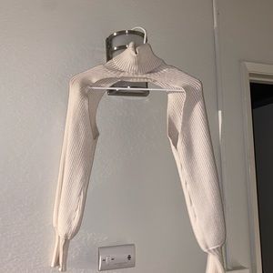 cream colored cropped sweater